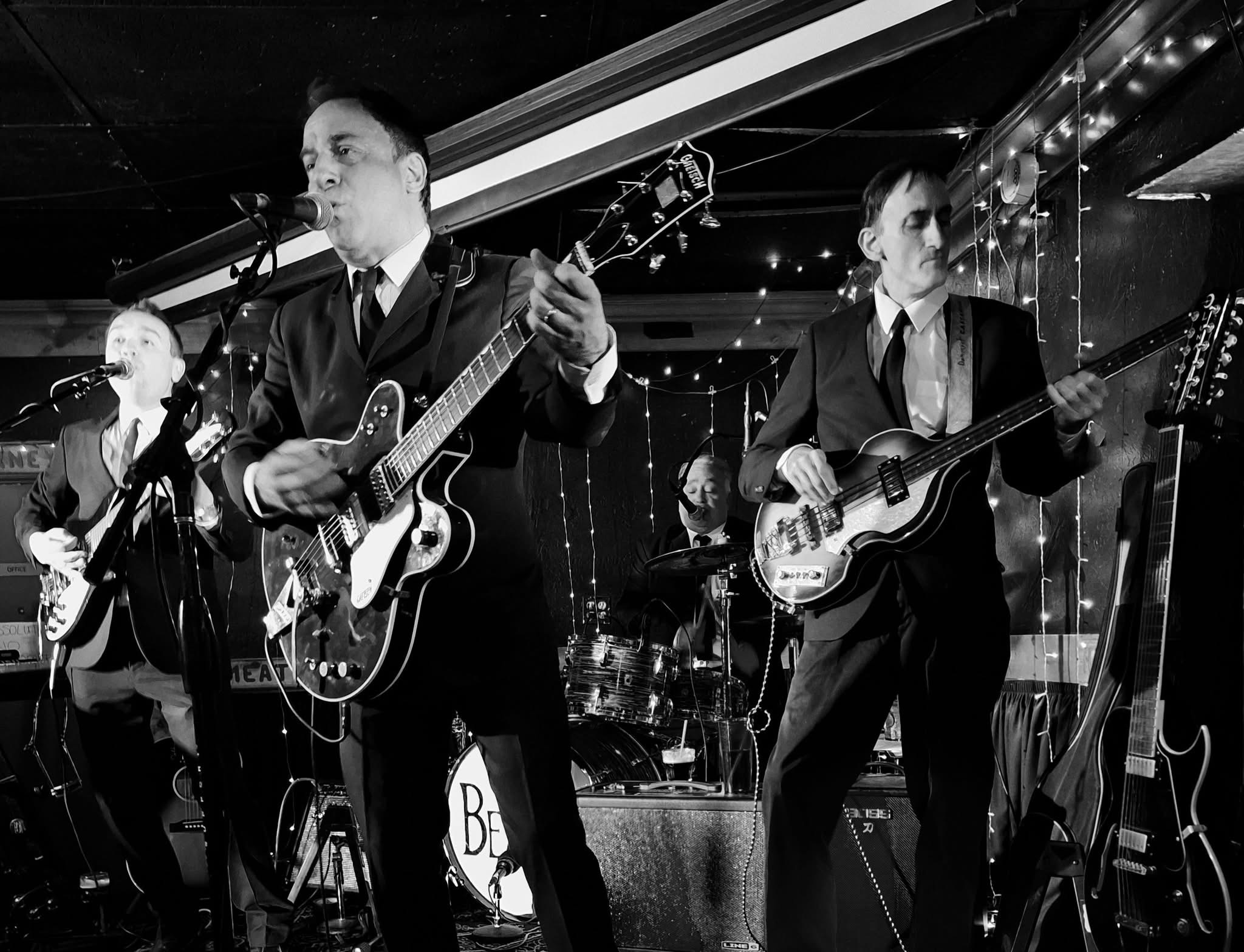 Boots & Suits playing under stage lights