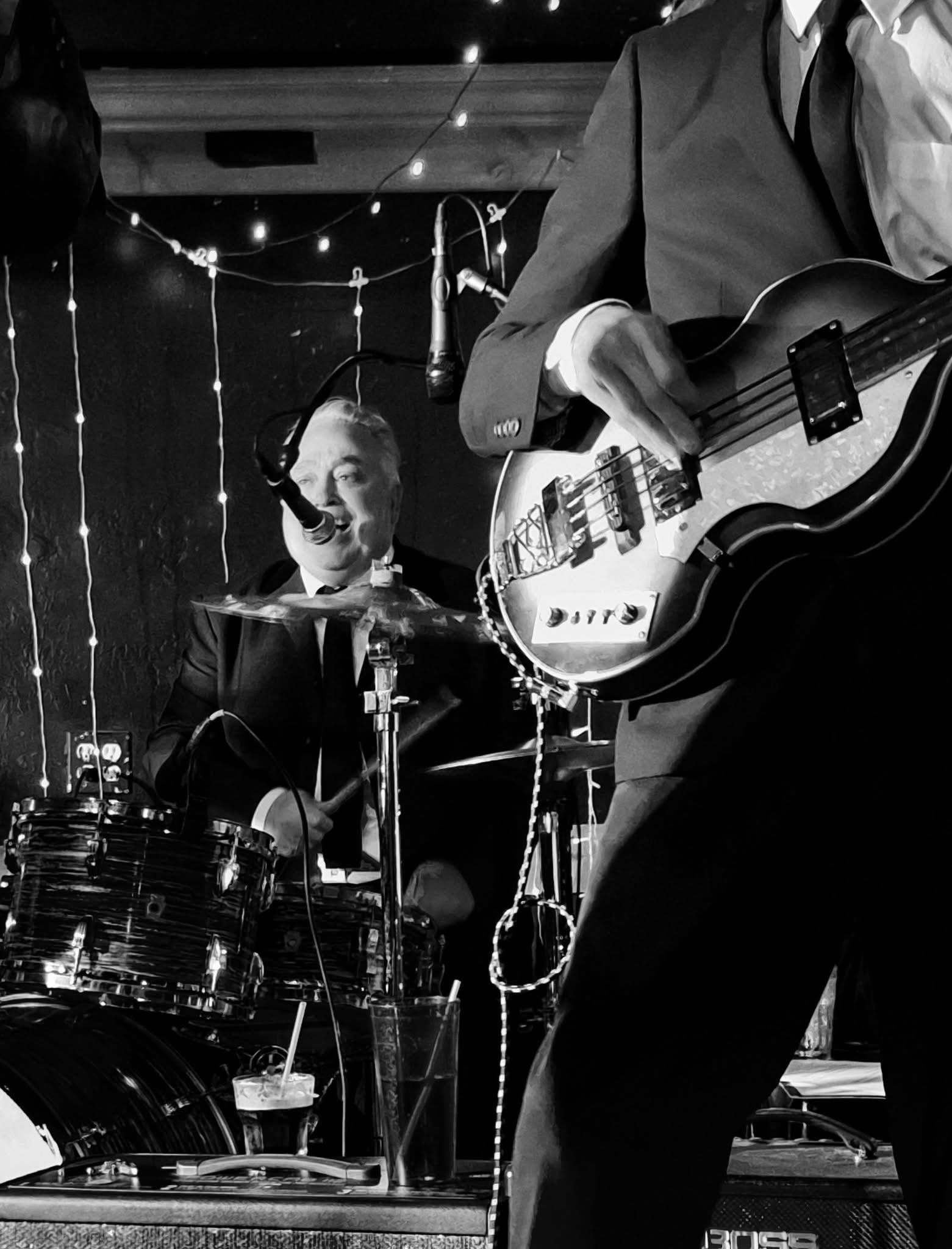 Boots & Suits drummer keeping time mid-set