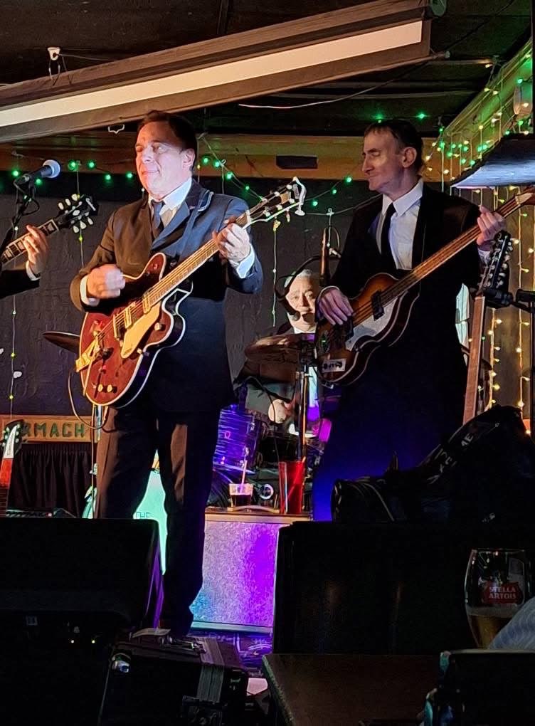 Boots & Suits guitarist and vocalist performing live
