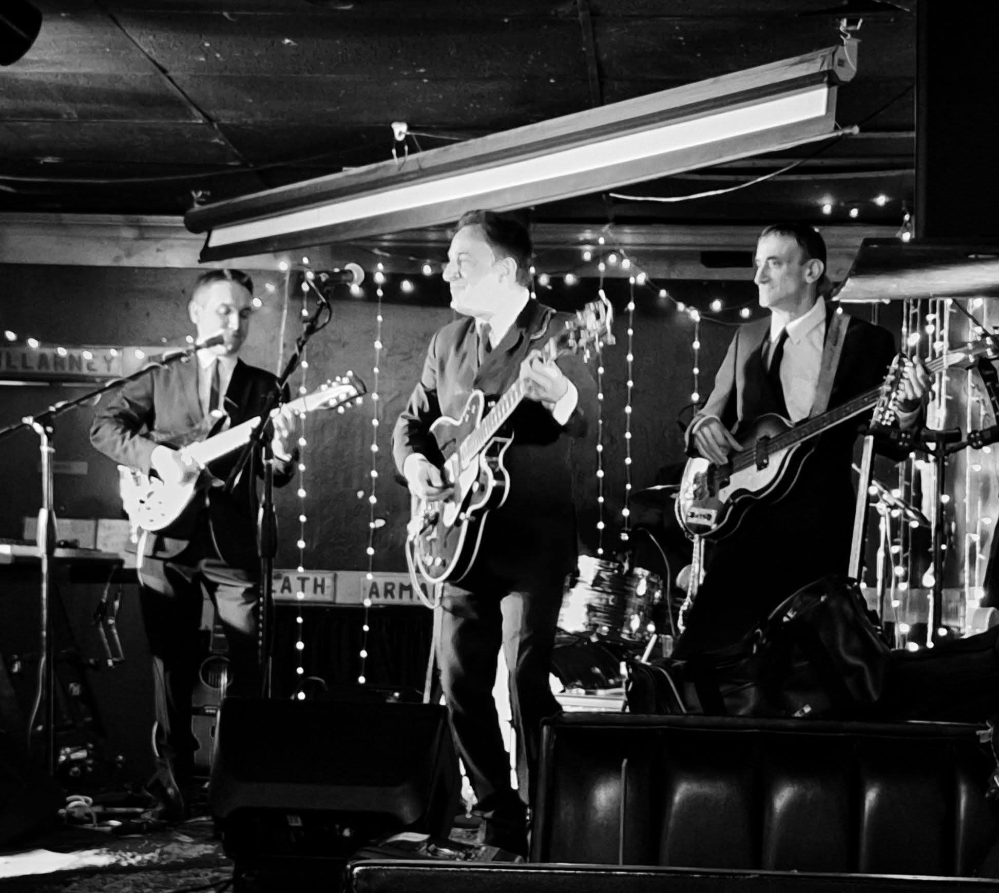 Boots & Suits performing early Beatles hits on stage